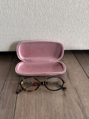 Miu Miu Tortoiseshell Round Glasses with Pink Velvet Case